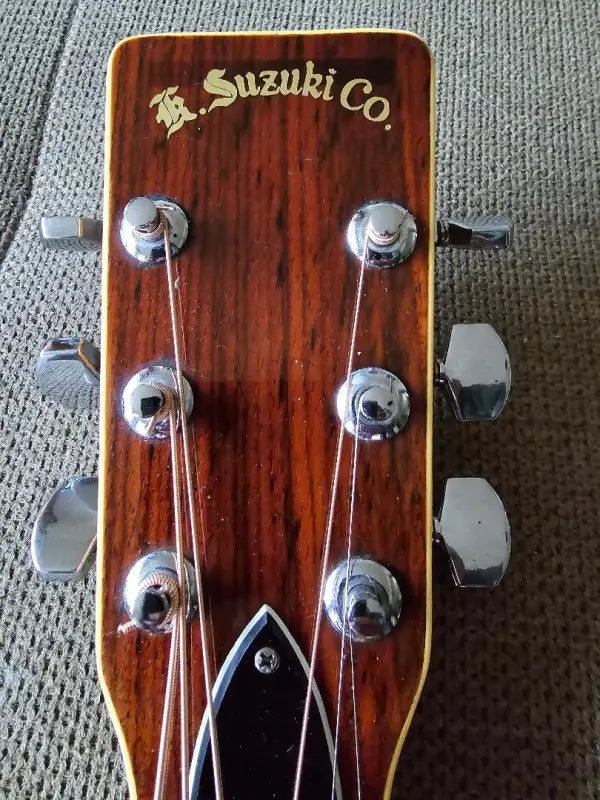 Suzuki K. Suzuki W-300 Martin Lawsuit Guitar Headstock