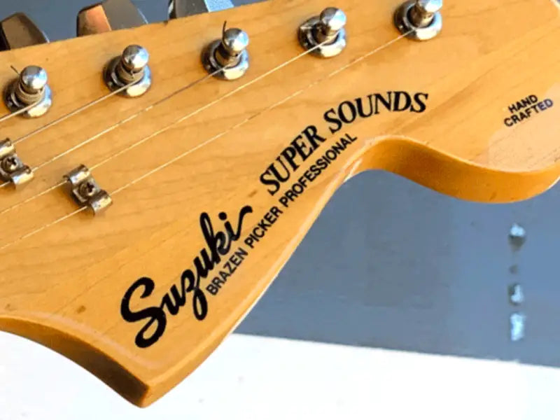 Suzuki Super Sounds Strat Lawsuit Guitar Headstock Decal Logo Matsumoku